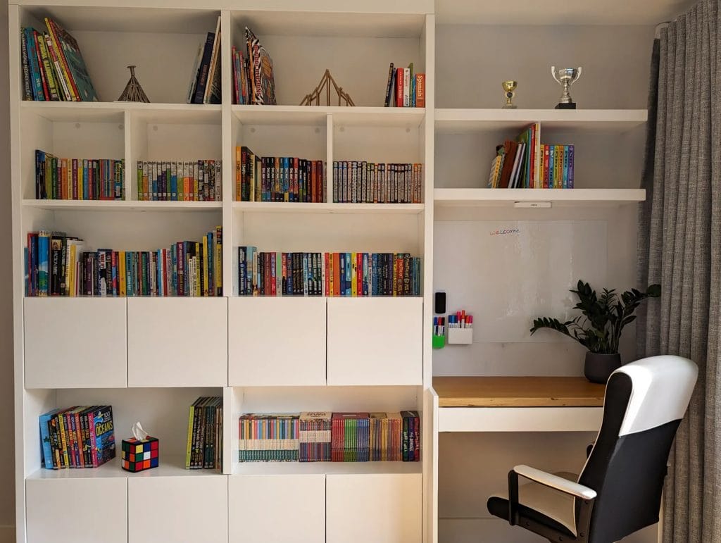 Bespoke bookcase and bespoke cupboards with an alcove desk