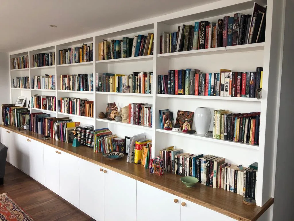 bespoke built in cupboards and custom book shelves