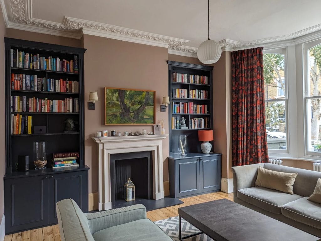 shelving either side of a fireplace
