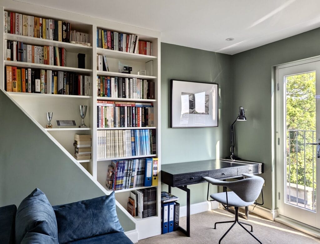 home office set up with bookshelves