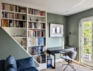 home office set up with bookshelves